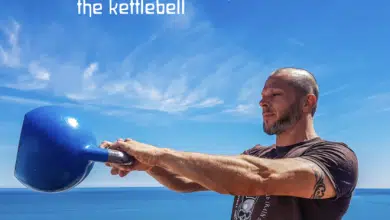 man holding kettlebell
