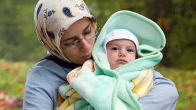 muslim woman with baby