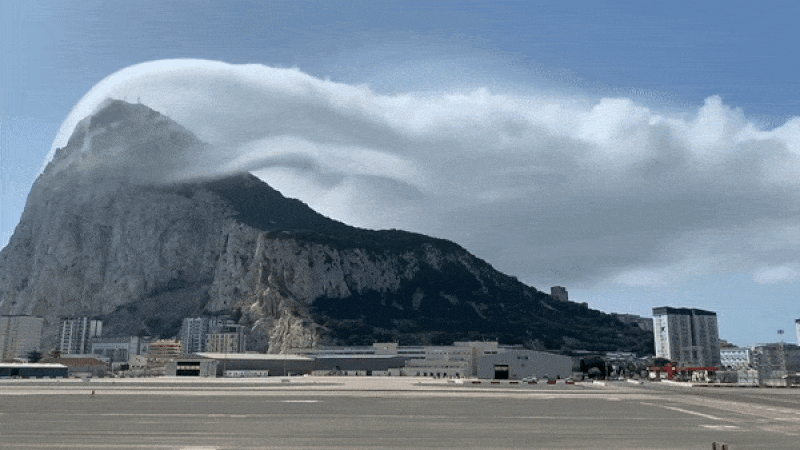 Time-lapse footage of a banner cloud, known as a Levanter, forming around the peak of the Rock of Gibraltar.